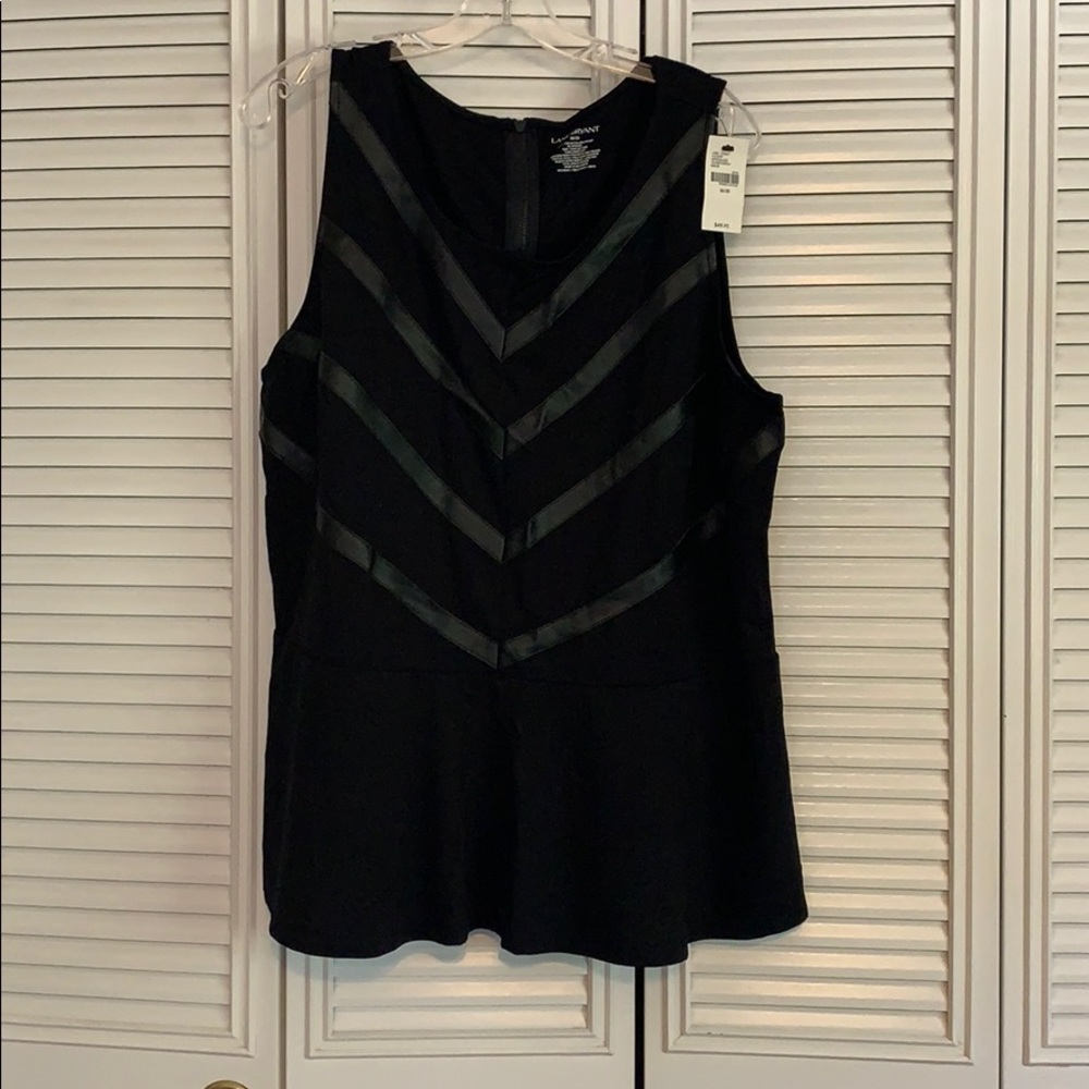 Black peplum top with faux leather detail.